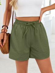 Army green jogger shorts with drawstring waist and pockets