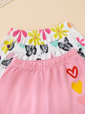 Baby shorts set with butterfly and floral prints, pink with heart appliques.