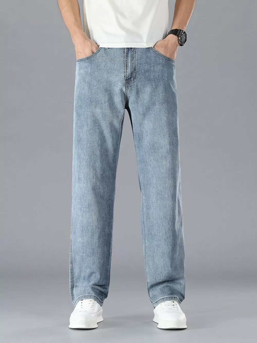 Light blue cotton straight leg jeans with a casual fit.