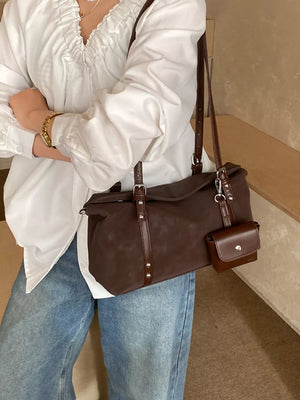 Leather Shoulder Bag With Detachable Pouch in Brown, close-up detail
