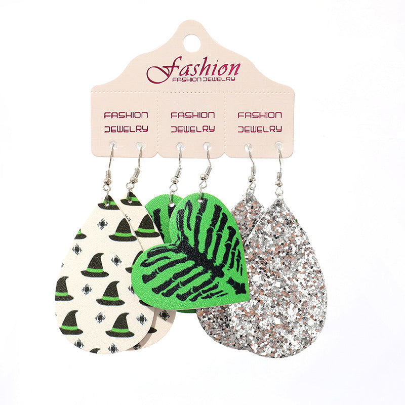 Halloween dangle earrings set with witch hats, skeleton hands, and glitter designs.