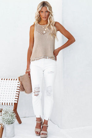 Tan openwork knit tank top with crochet neckline and fringe trim.