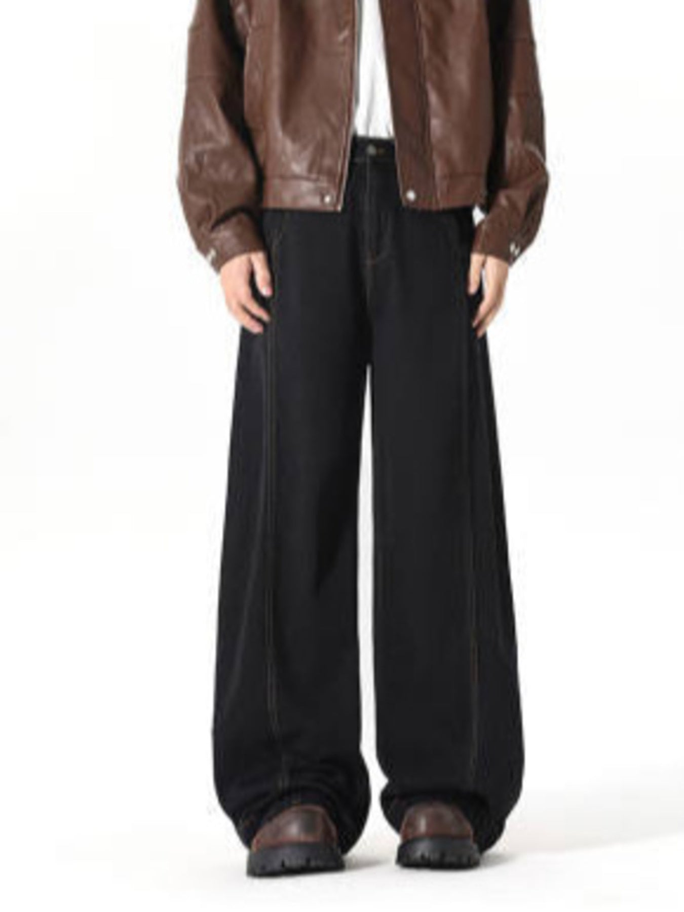 Black 100% cotton wide-leg jeans with contrast stitching and baggy fit.