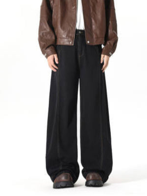 Black 100% cotton wide-leg jeans with contrast stitching and baggy fit.