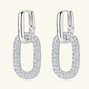 Pave oval link drop earrings in silver with sparkling cubic zirconia accents.