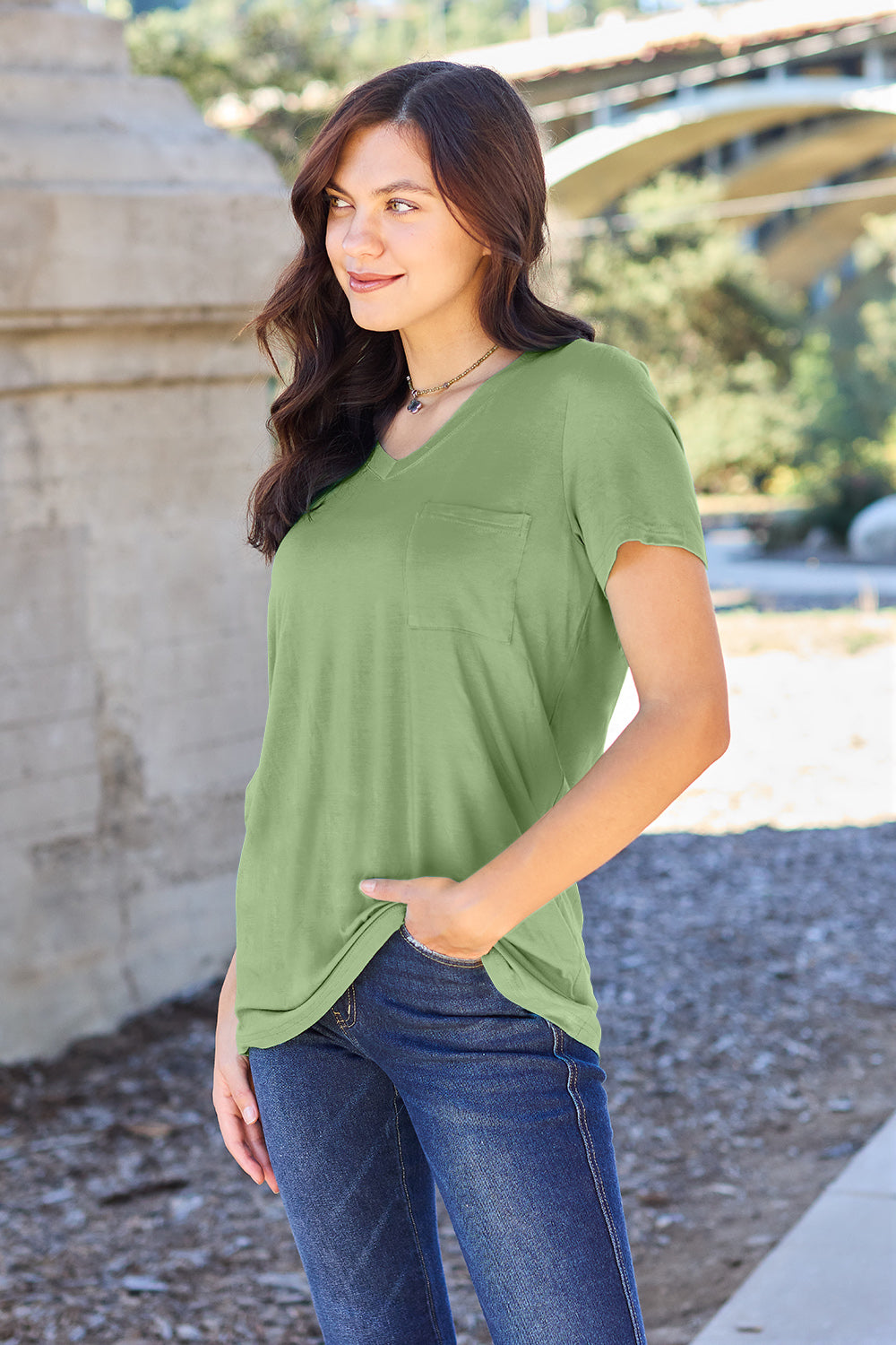 V-neck pocket tee in Matcha Green with short sleeves and a relaxed fit.