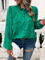 Dark green eyelet embroidered blouse with ruffle collar and button front.