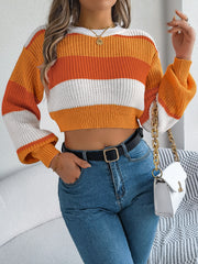 Striped balloon sleeve crop knit sweater in tangerine, sky blue, or cerise, made of acrylic.
