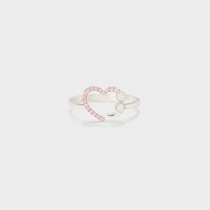 Sterling silver ring with a heart and semicolon design featuring pink stones and clear gems.