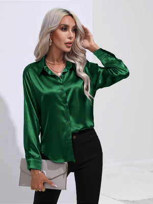 Dark green satin tie-front blouse with buttoned front and collar.