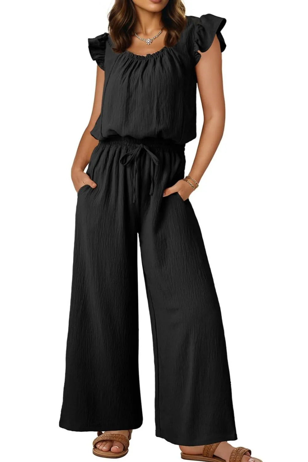 Black textured drawstring palazzo jumpsuit with ruffle sleeves and pockets