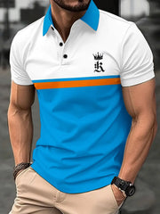 Colorblock polo shirt with crown graphic, orange stripe, and blue lower panel.