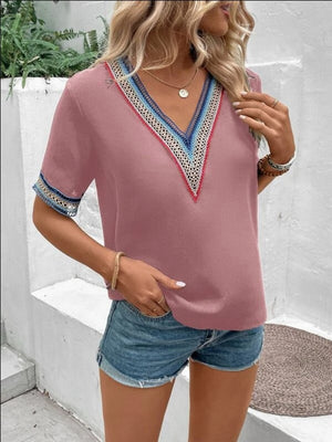 Dusty Pink V-neck top with embroidered trim on neckline and sleeves