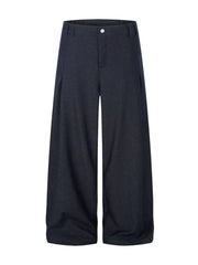 Relaxed fit dark heathered sweatpants with wide legs and front pleats.