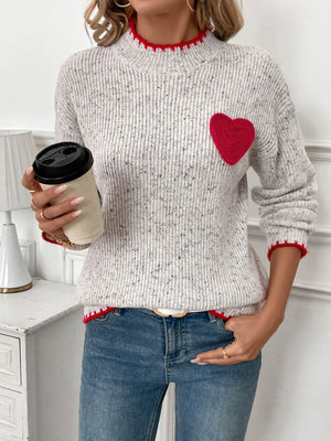 Light gray ribbed knit sweater with red heart appliqué and contrast trim.