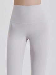White FlexFit leggings with wide waistband and 7/8 length.