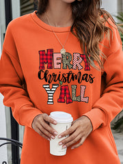 Orange crewneck sweatshirt with Merry Christmas Y'all graphic in plaid and animal print.