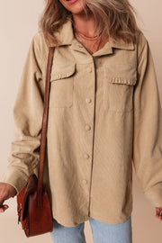 Tan corduroy utility shirt with ruffled chest pockets and button front.