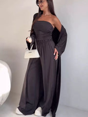 Chic dark gray three-piece maternity set with strapless crop top, wide-leg pants, and long cardigan.