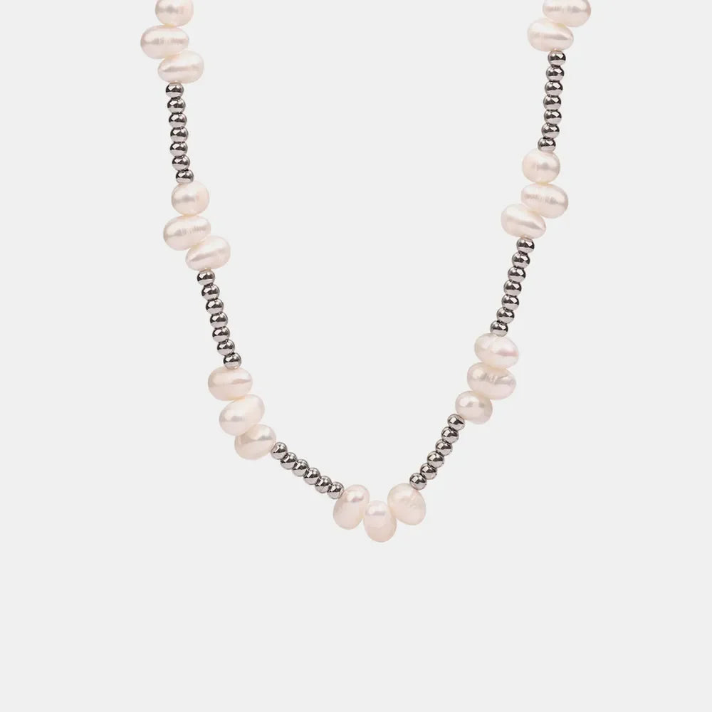 Silver necklace with irregular pearls and beaded accents