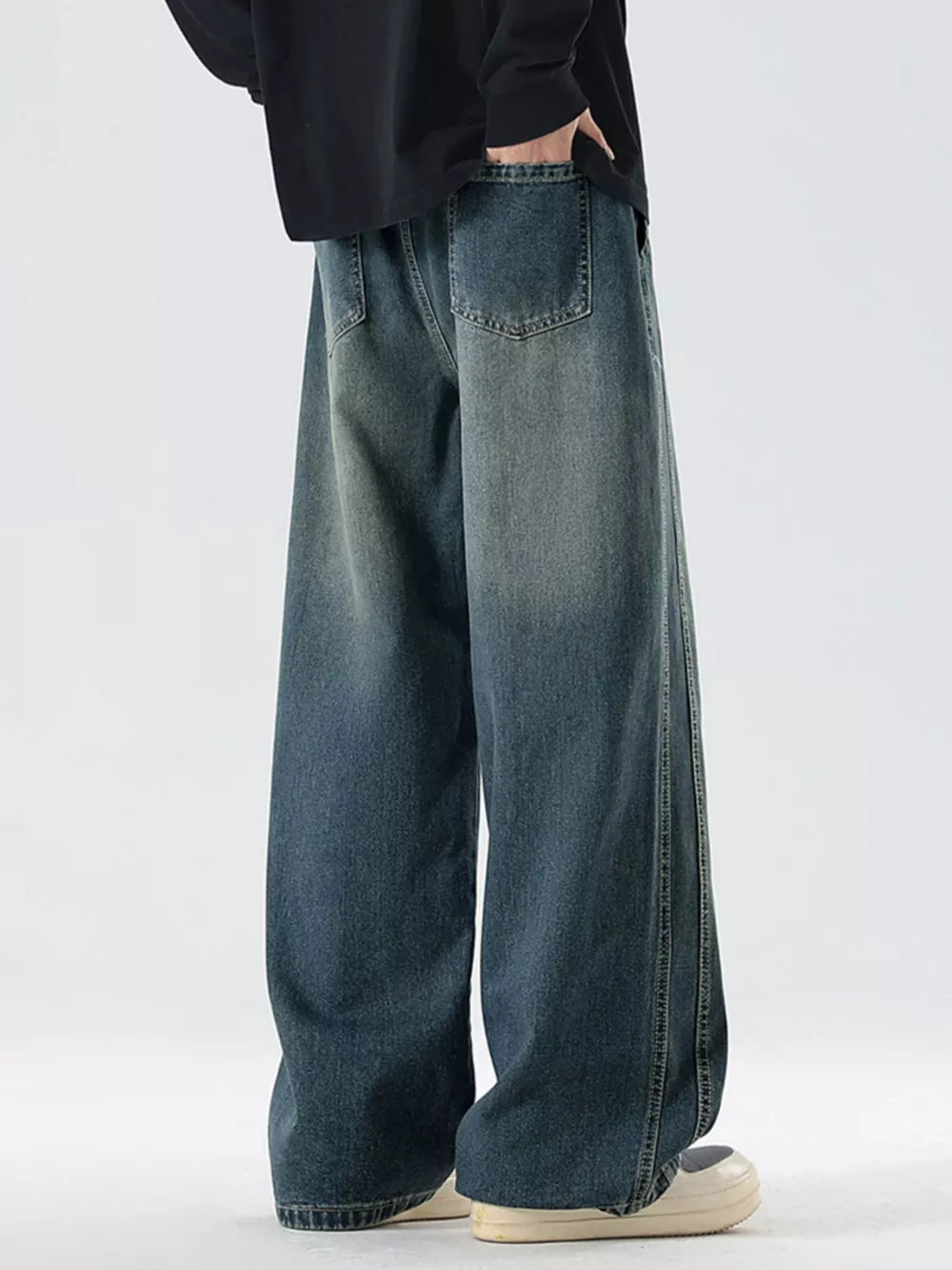 Oversized drawstring washed denim jeans in Vintage Blue with a relaxed fit and wide leg.