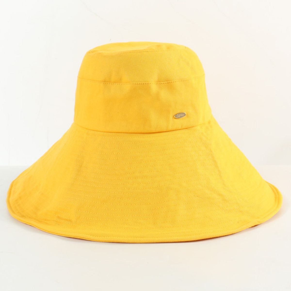Yellow cotton sun hat with a wide brim and UV protection.