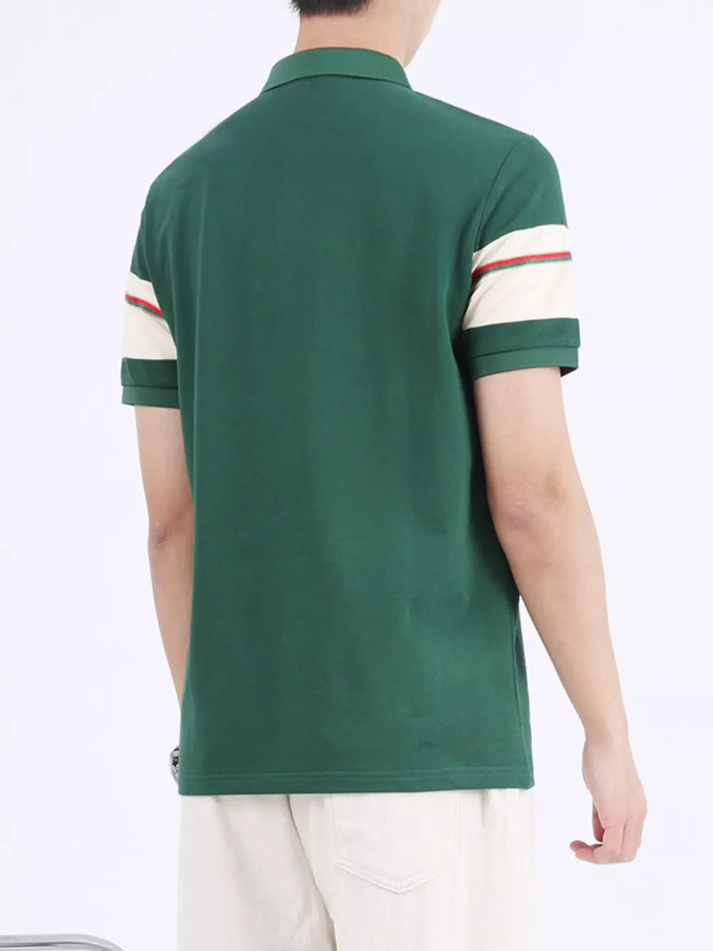Dark Green polo shirt with striped sleeve accents, made of combed cotton.