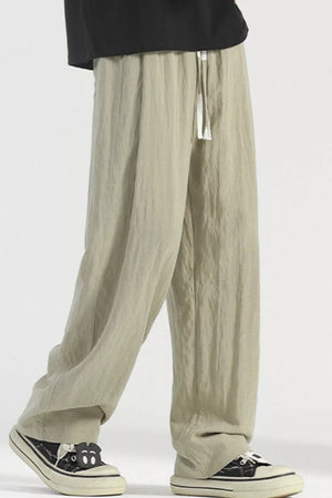 Lightweight wide-leg lounge sweatpants in Sage with drawstring waist and relaxed fit.