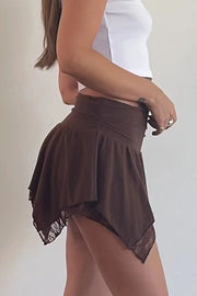 Dark brown lace trim mini skirt with asymmetric hemline and ruched waist detail.