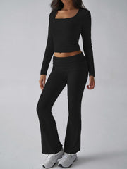 Black loungewear set with square neck crop top and flared pants