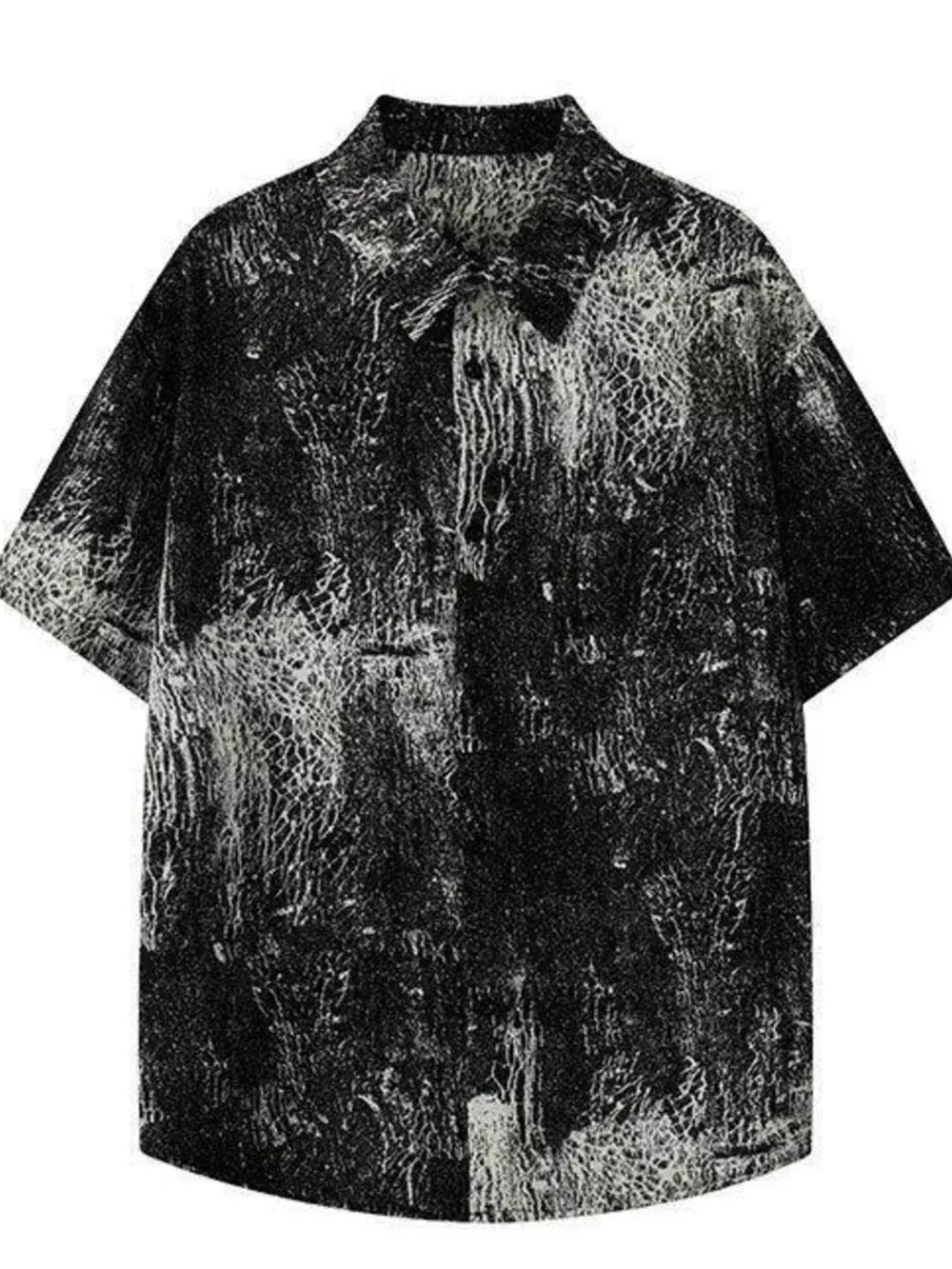 Men's oversized black and white abstract print cotton shirt with short sleeves.