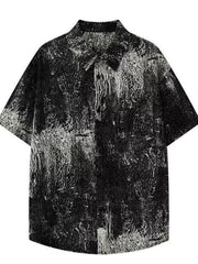 Men's oversized black and white abstract print cotton shirt with short sleeves.