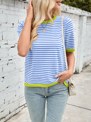 Striped knit tee in blue and white with neon green trim and short sleeves.