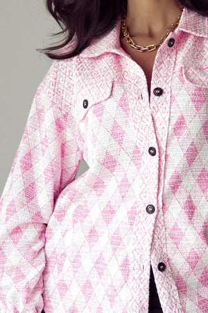 Pink diamond weave shacket with puff sleeves and buttoned front.