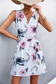 White floral zip-front mini dress with tie waist and v-neck