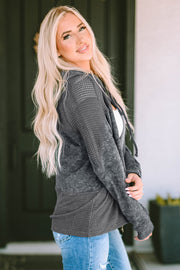 Colorblock knit zip-up hoodie in charcoal with waffle texture and mesh details.