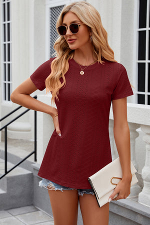 Burgundy perforated crewneck top with short sleeves and side slits