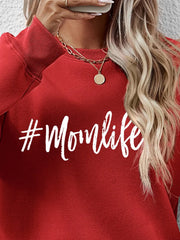 Crewneck sweatshirt in Deep Red with white #Momlife graphic.
