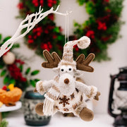 Brown knit reindeer Christmas ornament with snowflake detail and pom-pom hat.