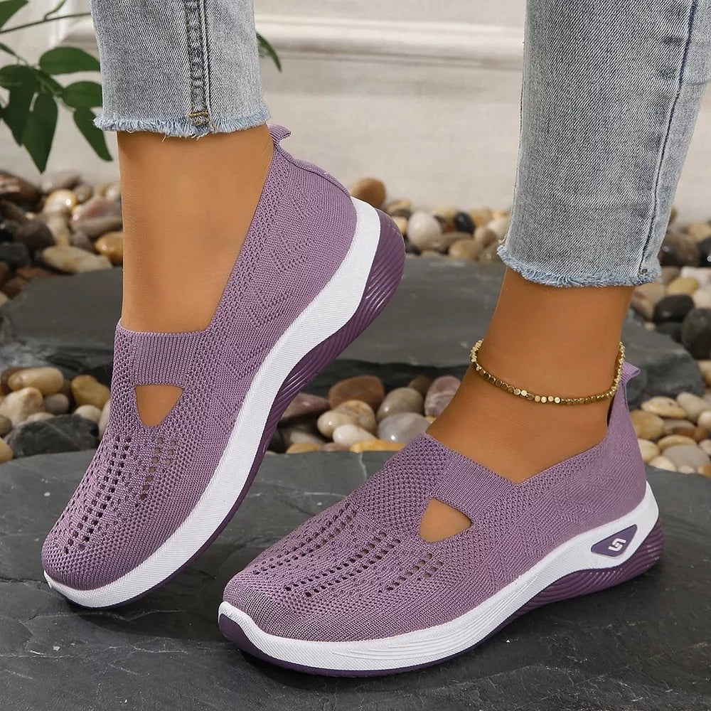 Purple breathable mesh slip-on shoes with white soles and a chunky sole.