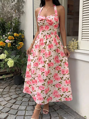 Romantic floral halter midi dress with a-line cut and sweetheart neckline.