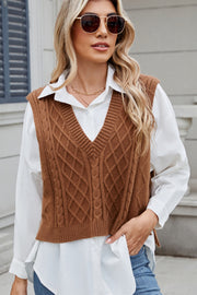 Caramel cable knit diamond pattern sweater vest with V-neck and ribbed trim.