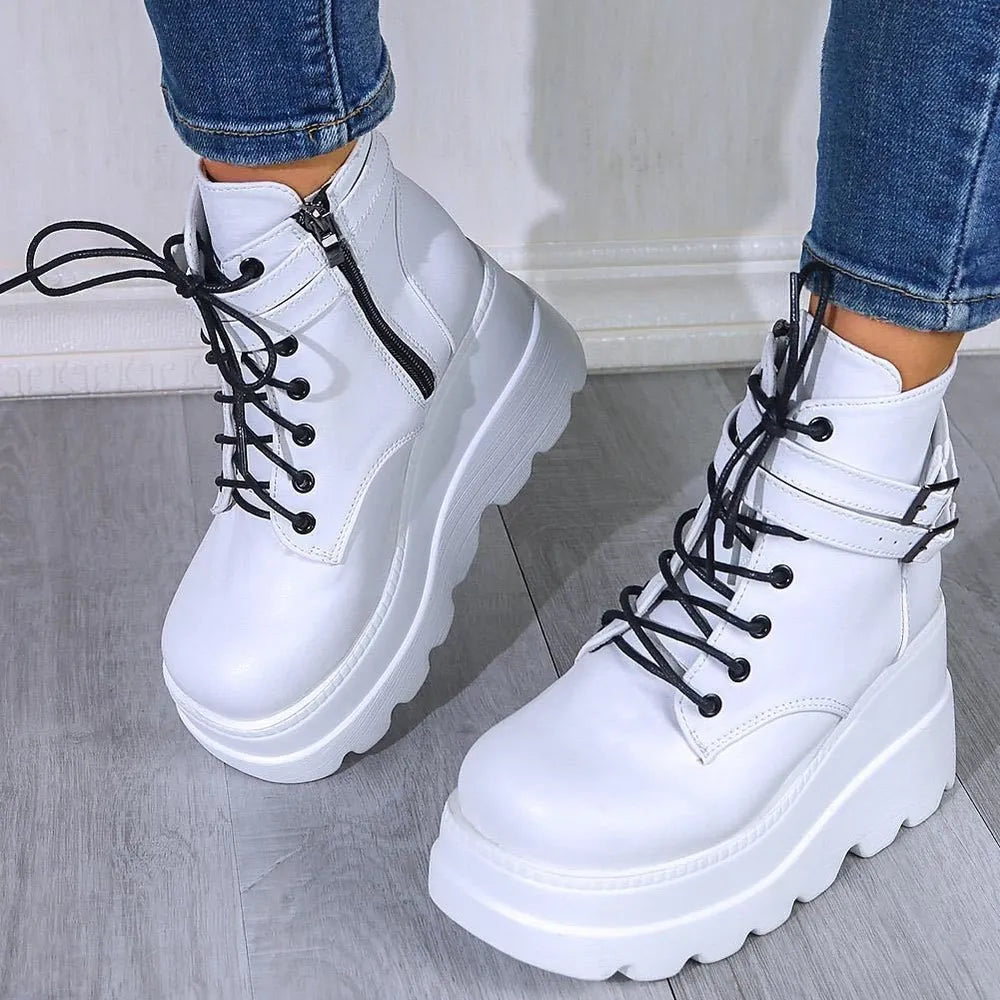 White platform buckle lace-up booties with side zipper detail.