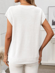 White cable knit V-neck vest with short sleeves and ribbed trim.