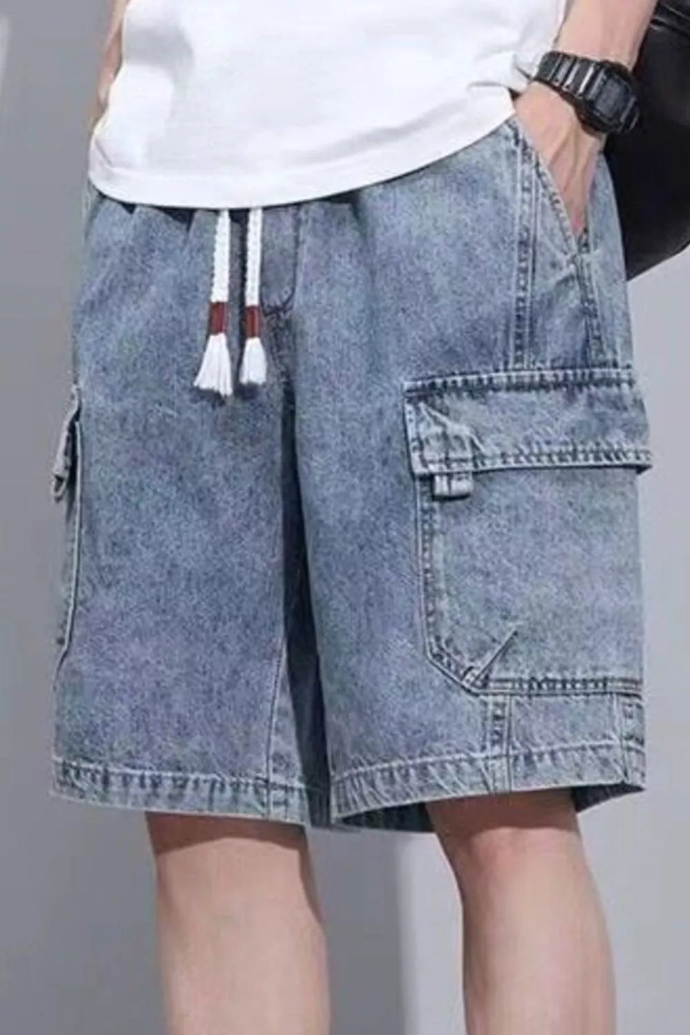 Blue denim cargo shorts for him with drawstring waist and utility pockets.