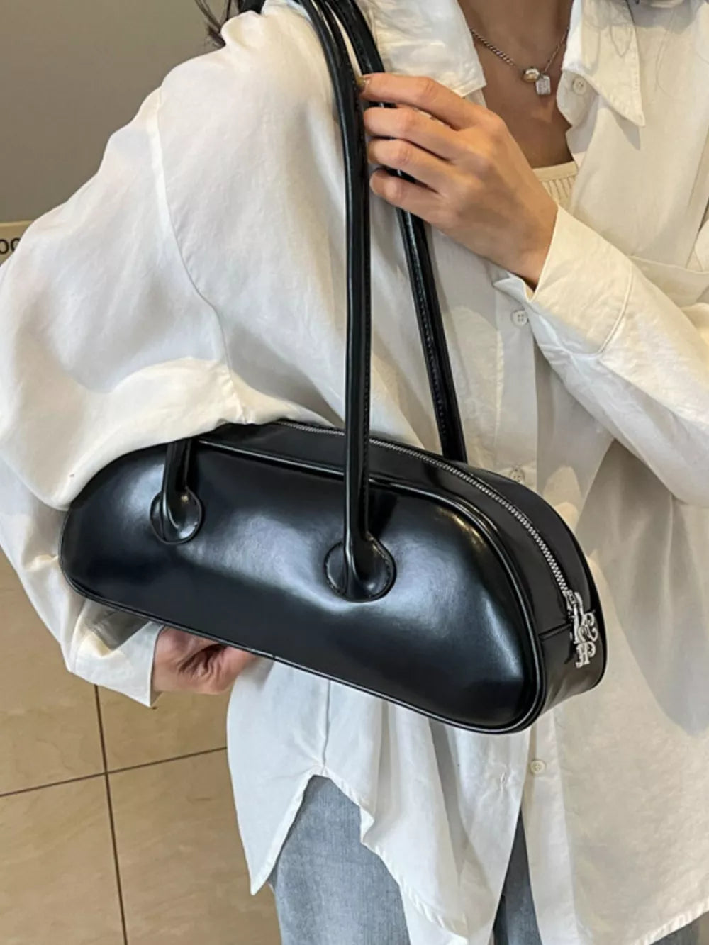 Black minimalist pu leather shoulder bag with top handles and zipper closure