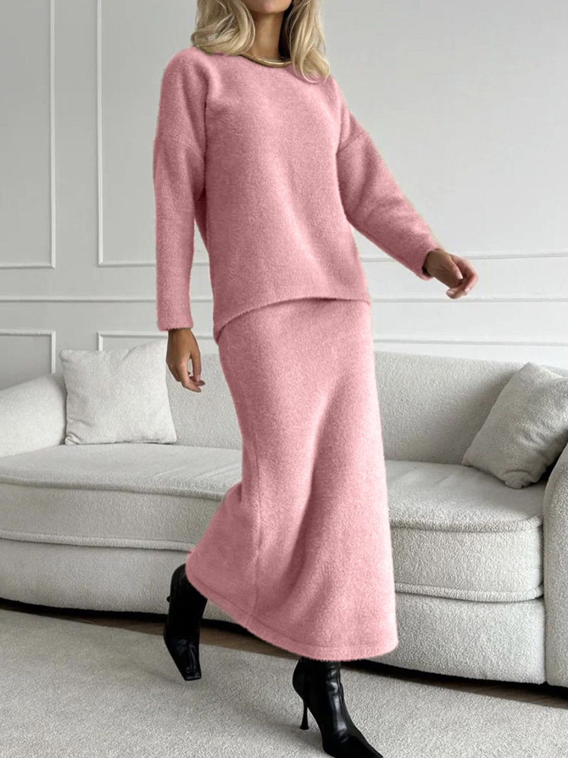 Textured knit co-ord set in blush pink, featuring a relaxed fit sweater and maxi skirt.