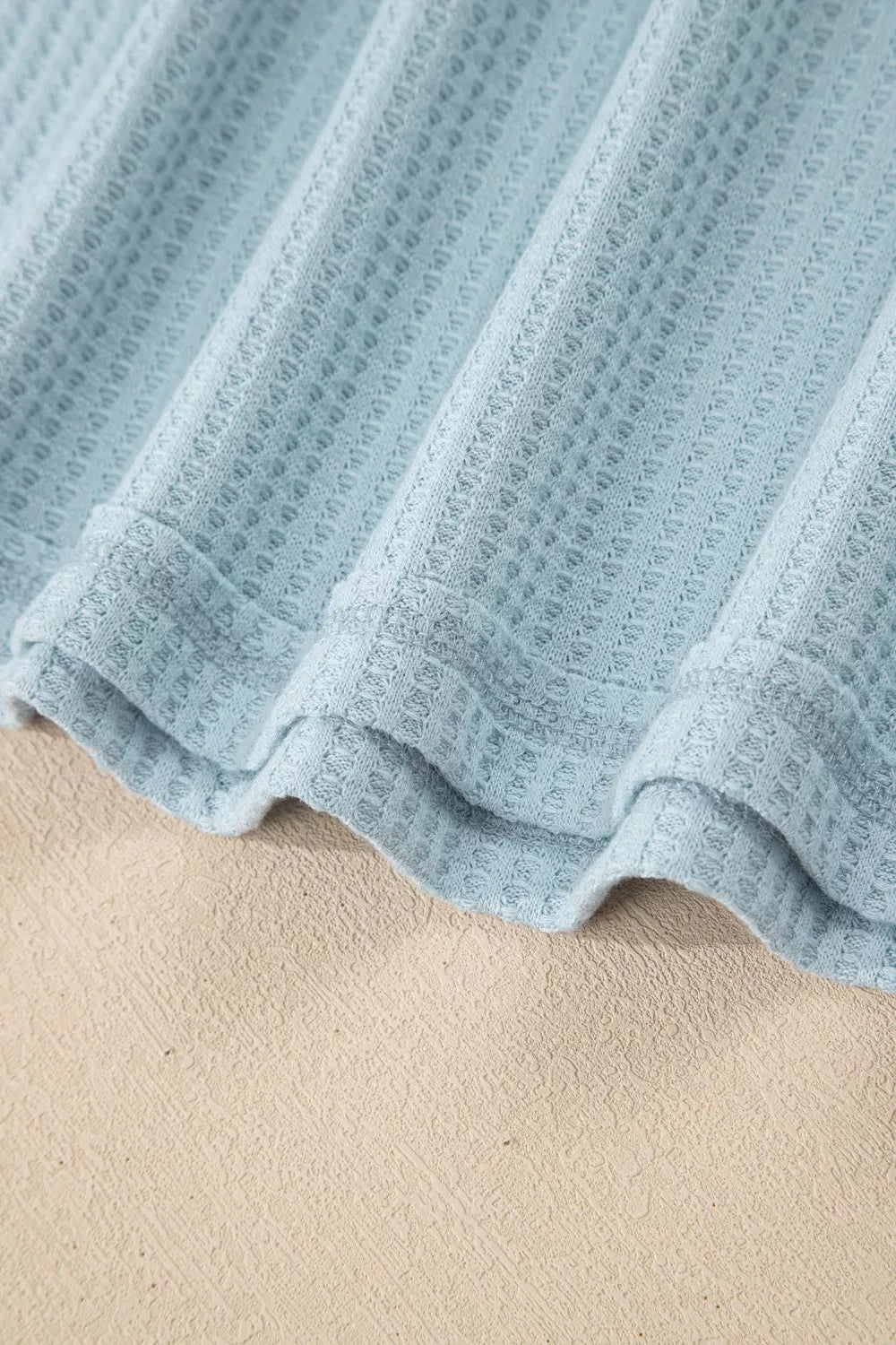 Light blue textured waffle knit maternity overshirt with cuffed sleeves