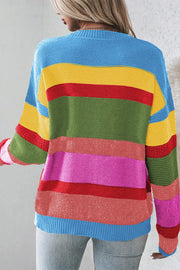 Rainbow stripe knit crewneck sweater with crew neck and long sleeves.