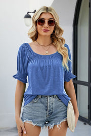 Cobalt blue gathered square neck puff sleeve top with ruffled cuffs.